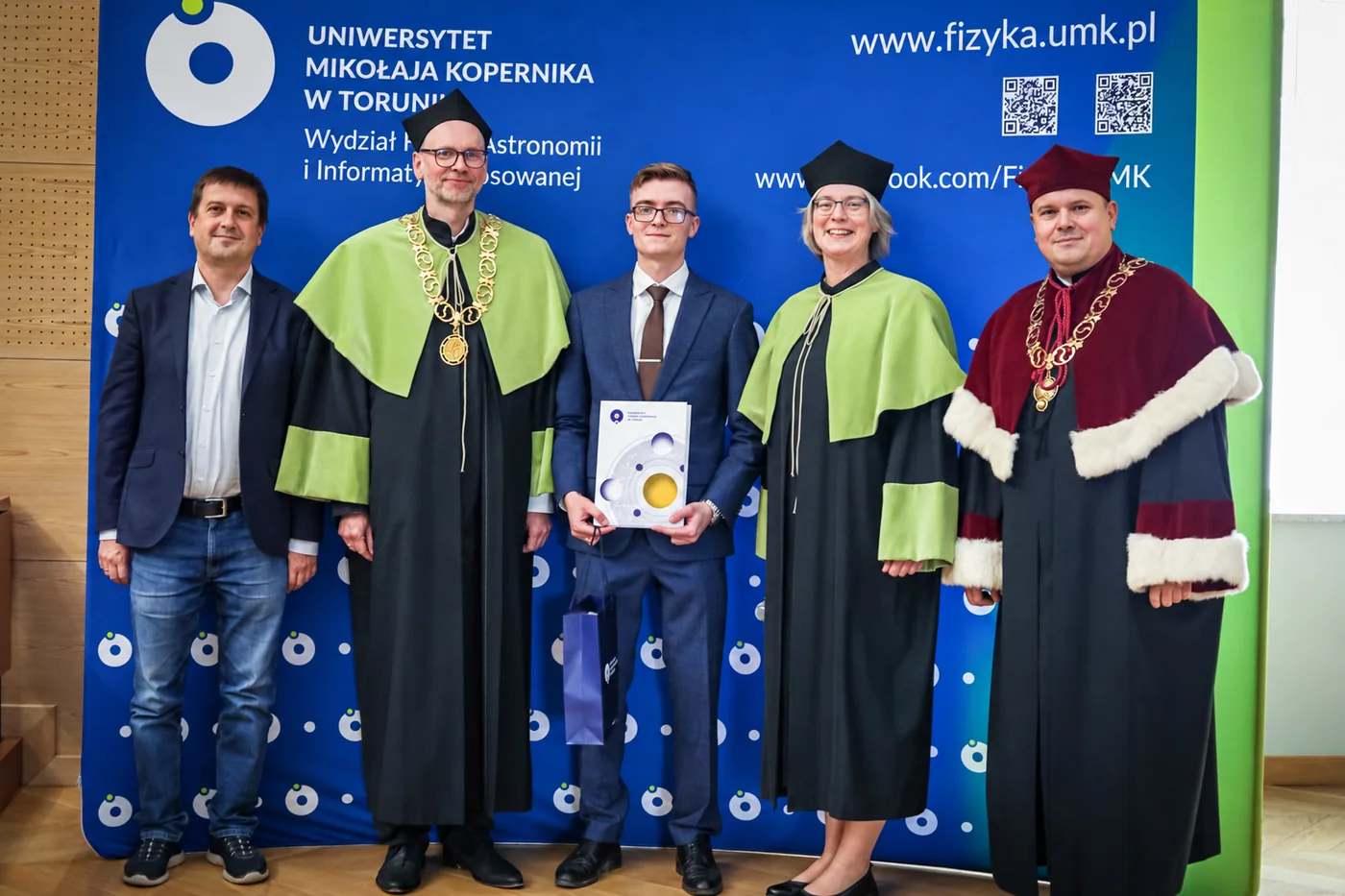 From left: P. Masłowski, W. Drozdowski, Marcin Makowski holding his award certificate, A. Bartkiewicz and R. Sojak