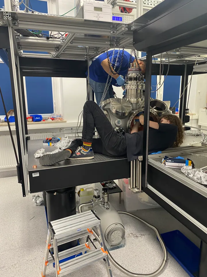 Assembling the cryocooler and components inside the vacuum chamber