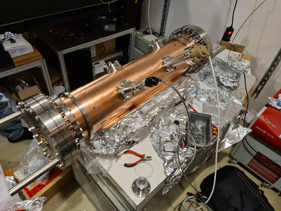 Long copper chamber during laboratory assembly